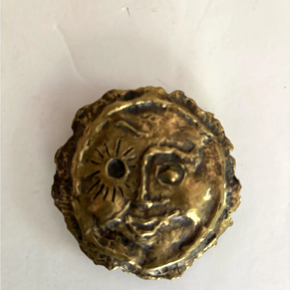 Three vintage belt buckles
